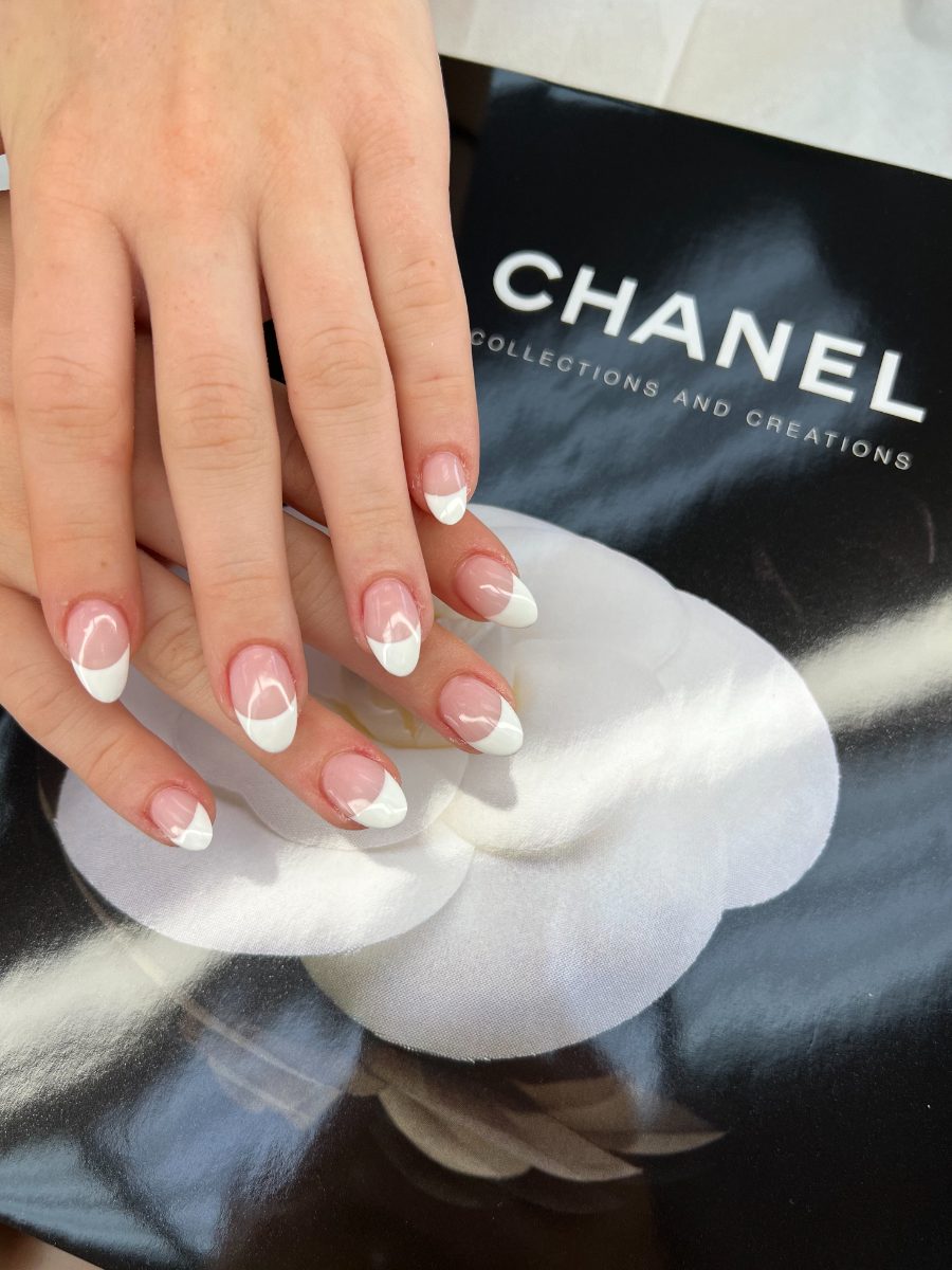 Classic white French tip on almond nails at our Cambrian Park salon