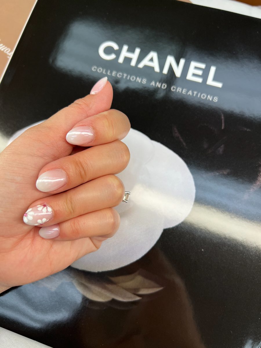 Soft pink ombré with a flower accent nail at our Cambrian Park salon